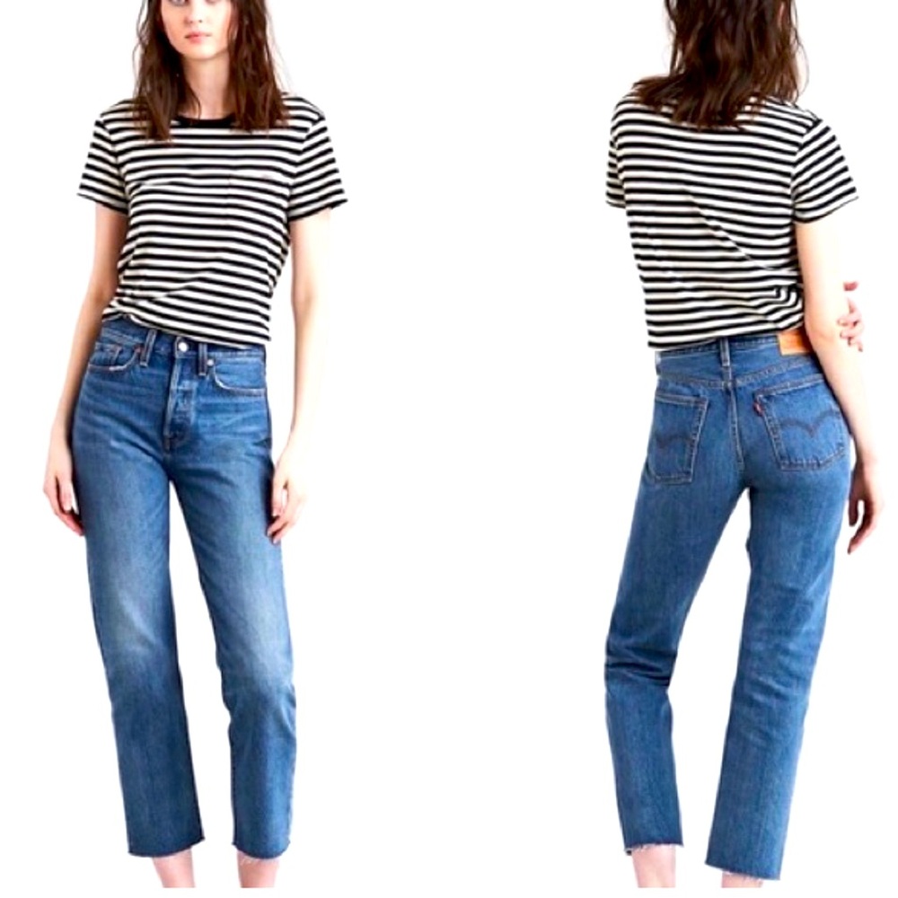 Levi’s button fly, mid rise, straight leg jeans. 
S40197